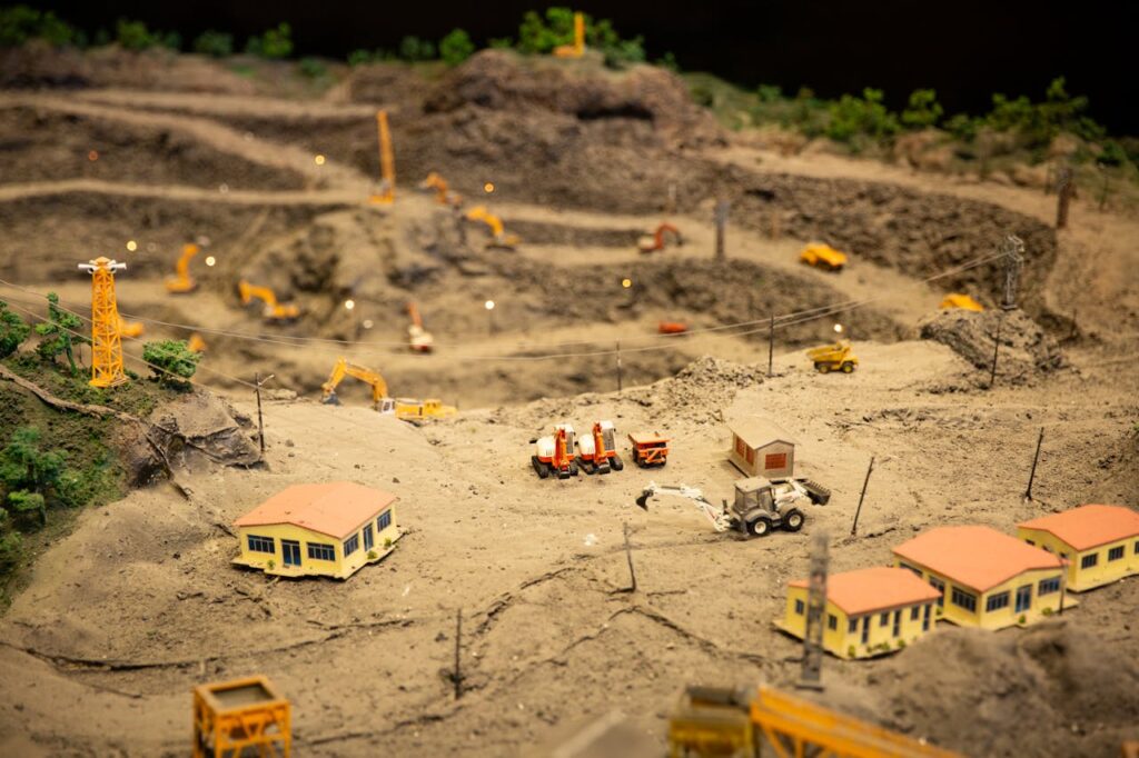 Miniature construction site with various equipment